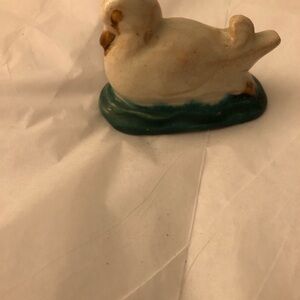 Antique duck figurines